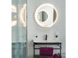 Das edle Steingut «Rosenspitz» bestimmt den Look des Bades. Der Duravit Möbelwaschtisch «Happy D.2 Plus» bringt Modernität hinein. Hug Baustoffe AG.
